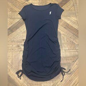 ribbed bodycon mini dress featuring a crew neckline and side ruching